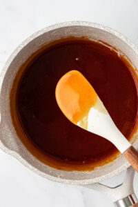 Flan caramel sauce in pot.