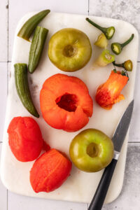Tomatoes, tomatillos, and peppers after boiling.