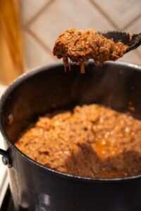 Picadillo pork filling for Mexican tamales after adding spices.